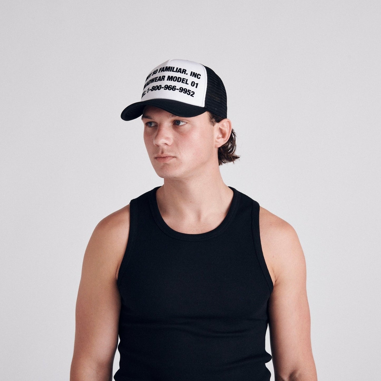 NSF TRUCKER CAP BLACK AND WHITE