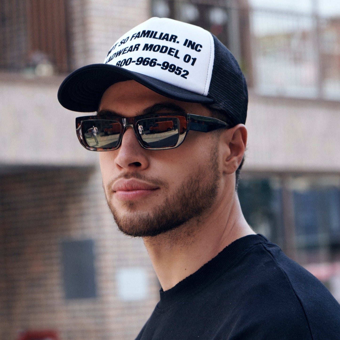 NSF TRUCKER CAP BLACK AND WHITE